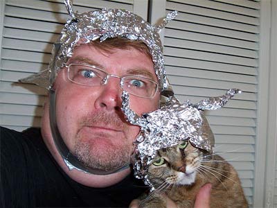 http://www.thepeoplescube.com/images/captions/Tinfoil_Hat_Cat.jpg